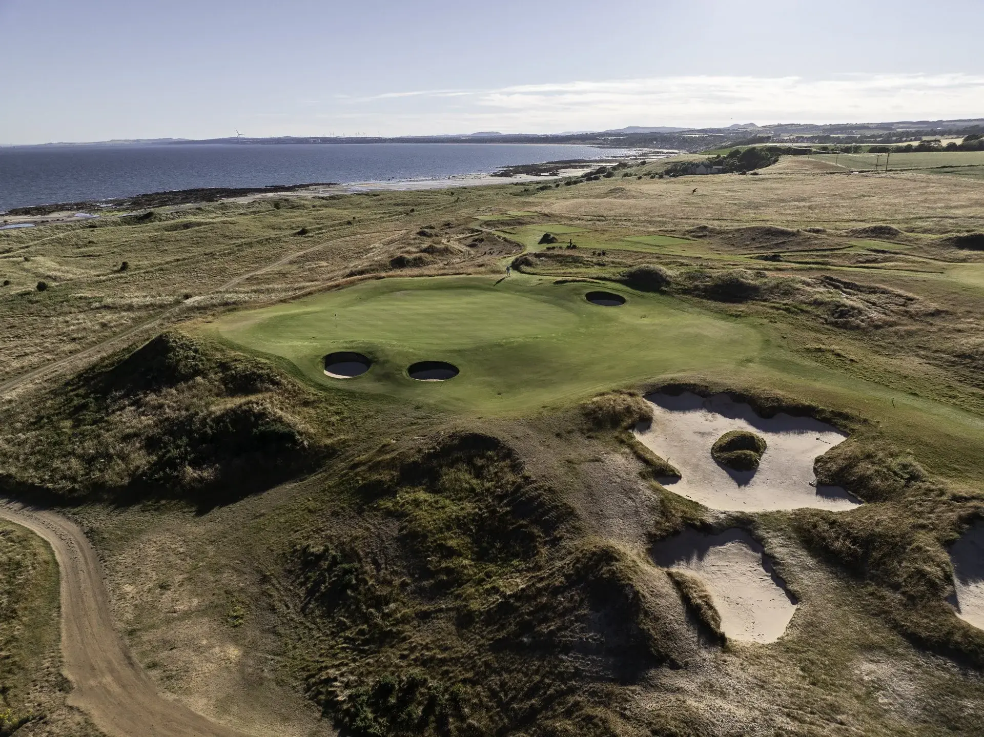 Aerial of Dumbarnie Links running down to the sea