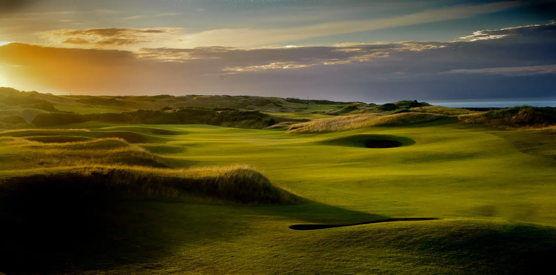 Golden light over the links at dawn